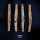The four sides of the single dice found at the site. You can see numbers at each end of the “stick”.
